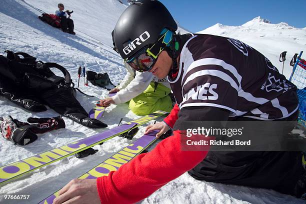 Norweigan skier Andreas Hatveit prepares his own skis before the Skiing Slopestyle Men Final during the Winter X Games Europe on March 12, 2010 in...