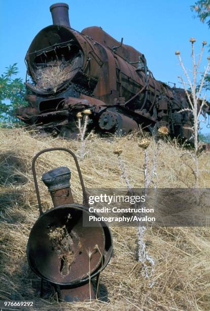 The Wreck of Tithorea. Greek Railway's La Class No.908 0-10-0 built by STEG of Vienna in 1926 lies abandoned in the dump at Tithorea. The design of...