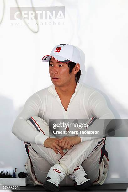 Kamui Kobayashi of Japan and BMW Sauber prepares to drive during practice for the Bahrain Formula One Grand Prix at the Bahrain International Circuit...