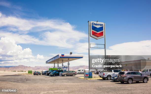 chevron gas station - chevron gasoline station stock pictures, royalty-free photos & images