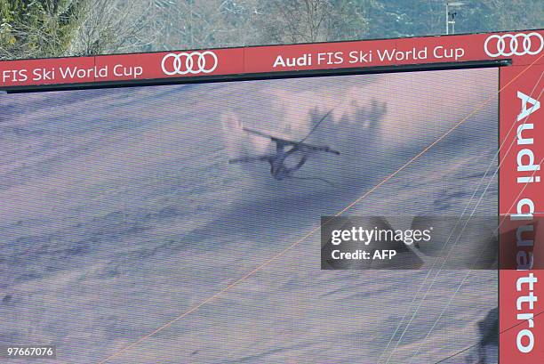 Julia Mancuso is seen on a gian video screen replay crashing in the during the women's Alpine skiing World Cup Super G Slalom finals in Garmisch...