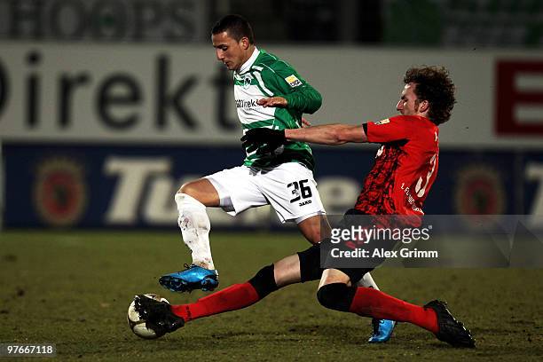 Sercan Sararer of Greuther Fuerth is challenged by Dominic Peitz of Berlin during the Bundesliga match between SpVgg Greuther Fuerth and 1. FC Union...