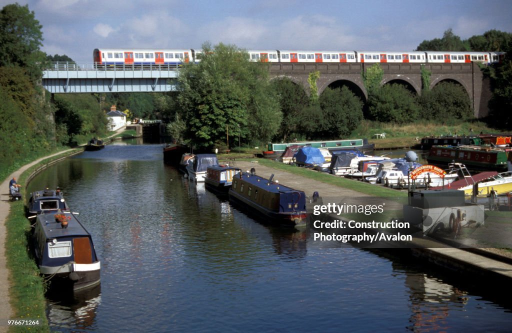 A Bakerloo line train crosses the Grand Union canal near to Watford