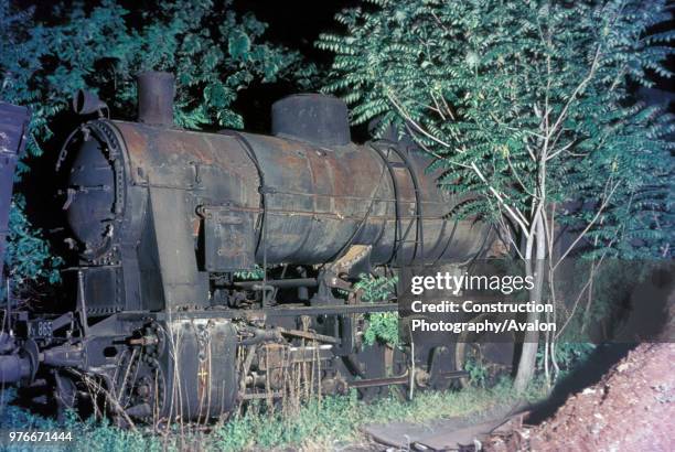 Belgian built 0-10-0 rots amid the locomotive dump at Thessaloniki in Greece on Saturday 15 May 1976.