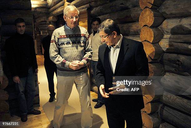 Swedish Foreign Minister Carl Bildt and his Turkish counterpart Ahmet Davutoglu talk to the press after their meeting in Saariselkä, Inari, in the...