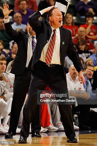 Head coach Thad Matta of the Ohio State Buckeyes reacts to a play during the game against the Michigan Wolverines in the quarterfinals of the Big Ten...