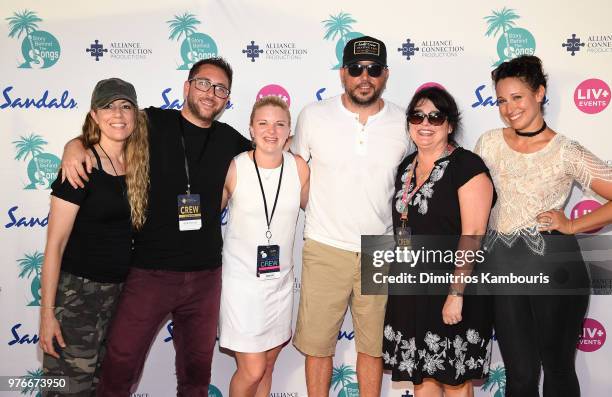 Drina Mohacsi, Bob Foglia, Madison Sewell, Jason Aldean, Melissa Mango and Amanda Sestak pose on the red carpet at Sandals Royal Bahamian during CMT...