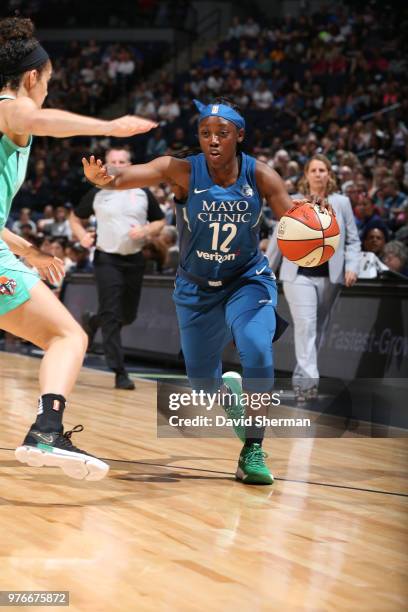 Alexis Jones of the Minnesota Lynx handles the ball against the New York Liberty on June 16, 2018 at Target Center in Minneapolis, Minnesota. NOTE TO...