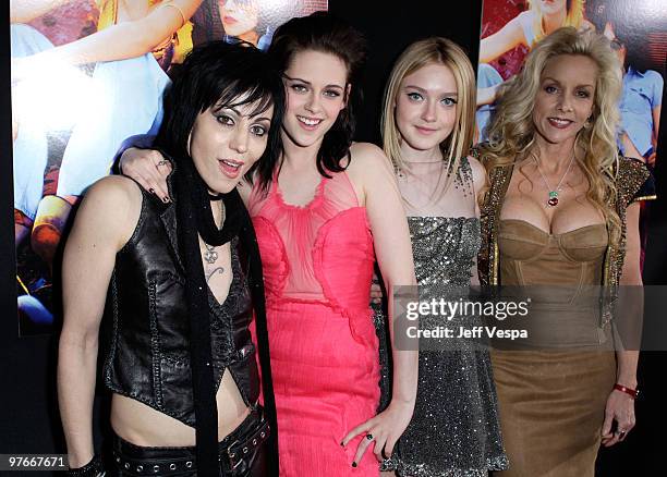 Musician Joan Jett, actress Kristen Stewart, actress Dakota Fanning and musician Cherie Currie arrive at the Los Angeles Premiere of The Runaways...