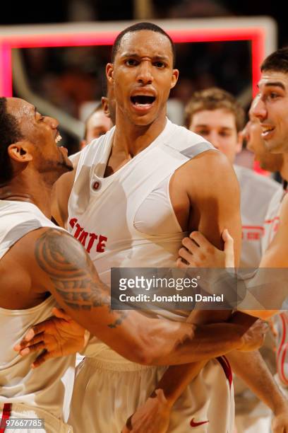 Guard Evan Turner of the Ohio State Buckeyes celebrates with his teammates after making a game winning three point basket to win their quarterfinal...