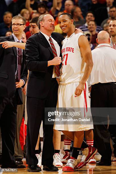 Guard Evan Turner of the Ohio State Buckeyes celebrates with head coach Thad Matta after making a game winning three point basket in their...