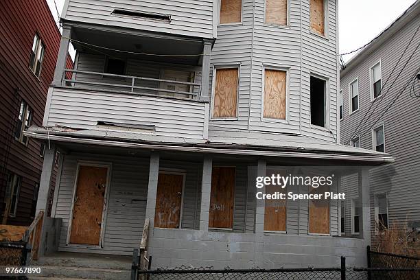 An abandoned property is boarded up on March 12, 2010 in Bridgeport, Connecticut. A new report by RealtyTrac Inc. Announced that the number of...