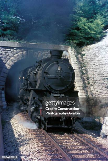 Former Prussian G12 Class 3 cylinder 2-10-0 classified 36 by Yugoslav Railways storms the gradient from Prvacina to Stanjel on the line between Nova...