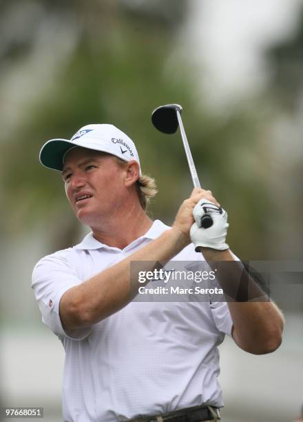 Ernie Els of South Africa tees off on the seventh tee box during round two of the 2010 WGC-CA Championship at the TPC Blue Monster at Doral on March...