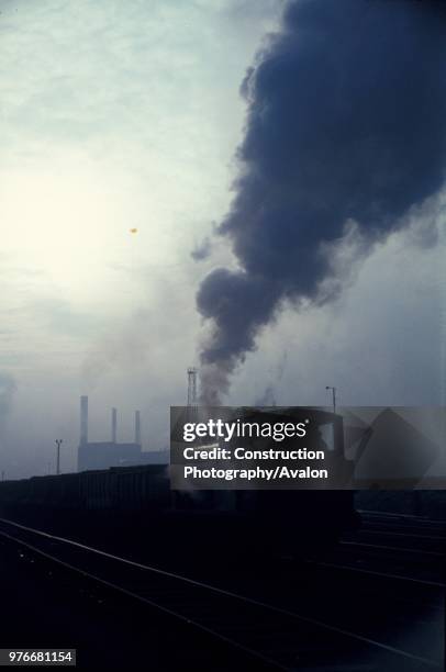 Minerals Division Kitson 0-6-0ST propels a rake of loaded iron ore wagons into the steelworks at Corby.