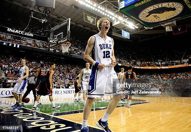 Kyle Singler of the Duke Blue Devils celebrates during win over the University of Virginia Cavaliers in their quarterfinal game in the 2010 ACC Men's...