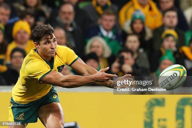 Nick Phipps of the Wallabies passes with the ball during the International test match between the Australian Wallabies and Ireland at AAMI Park on...