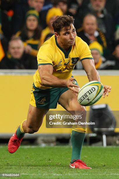 Nick Phipps of the Wallabies passes with the ball during the International test match between the Australian Wallabies and Ireland at AAMI Park on...