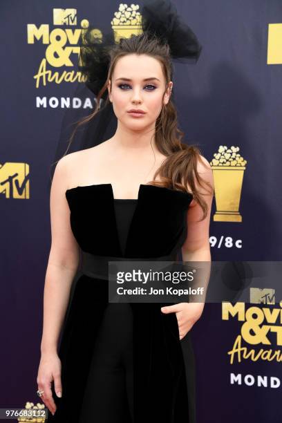 Actor Katherine Langford attends the 2018 MTV Movie And TV Awards at Barker Hangar on June 16, 2018 in Santa Monica, California.