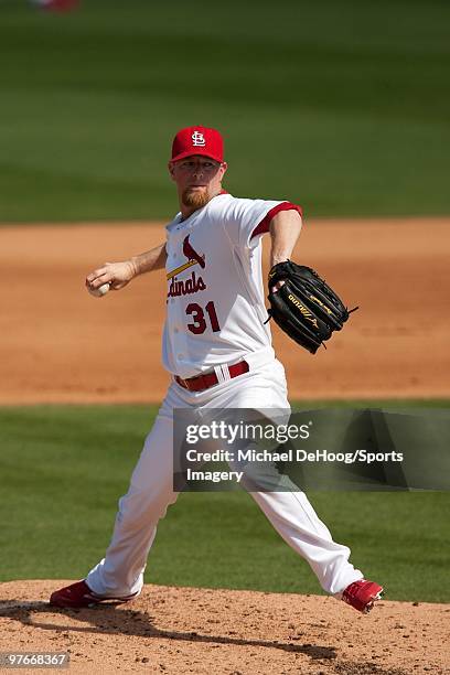 Pitcher Ryan Franklin of the St. Louis Cardinals pitches to the Washington Nationals at Roger Dean Stadium on March 10, 2010 in Jupiter, Florida.