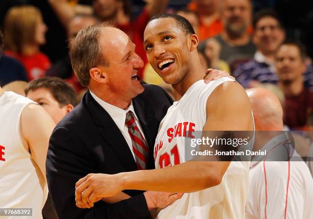 Guard Evan Turner of the Ohio State Buckeyes celebrates with head coach Thad Matta after making a game winning three point basket in their...