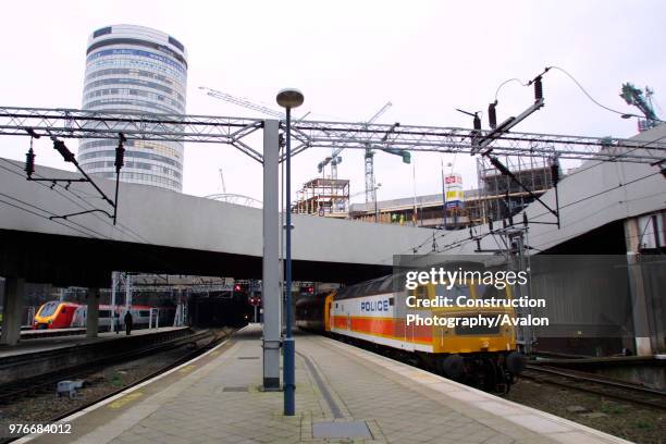 Police livered class 47829 at Birmingham New Street Station with the Rotundra in the background, 2003.