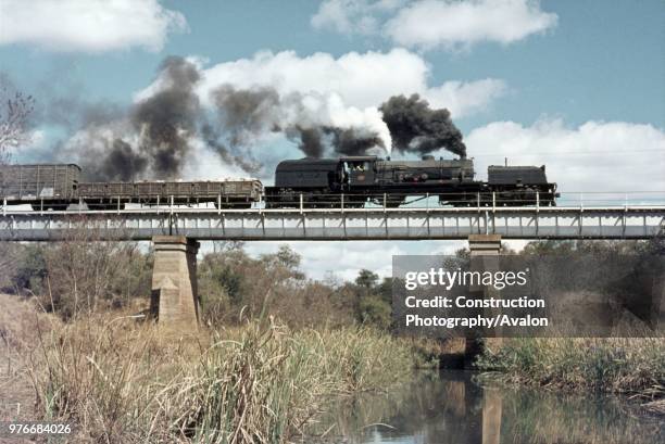 Rhodesia Railways 14A class 2-6-2 + 2-6-2 Garratt crosses the viaduct at Balla Balla at the head of train 304 bound for Bulawayo on the West...