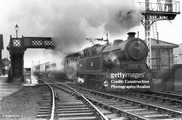Robinson A5 Class 4-6-2T No.49810 of Great Central origin with a rake of LNER teak coaching stock, circa 1956.