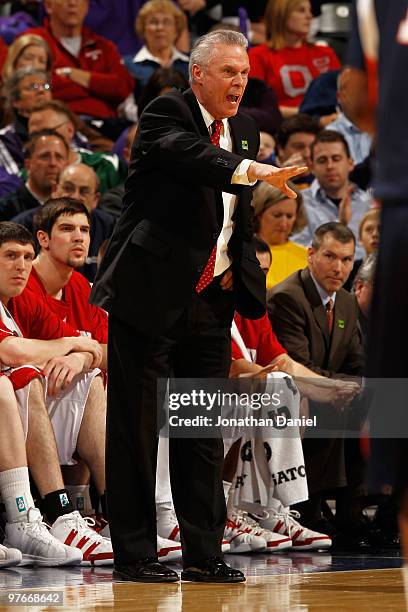 Head coach Bo Ryan of the Wisconsin Badgers signals to his team during their game against the Illinois Fighting Illini in the quarterfinals of the...