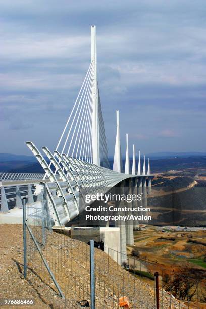 The 2,5 km Millau Viaduct, France, is the highest bridge in the world, Each of its sections spans 350 meters and its columns range in height from 75...