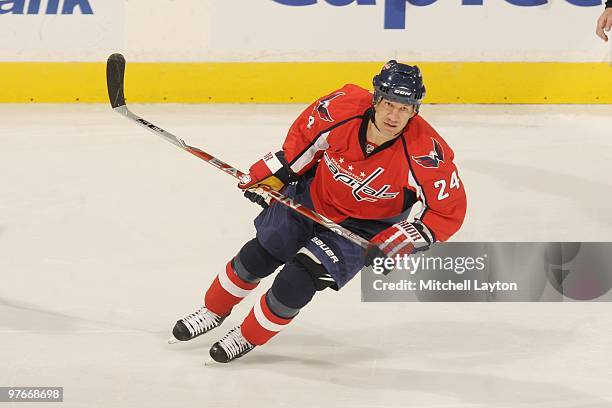Scott Walker of the Washington Capitals looks on during a NHL hockey game against the Tampa Bay Lightning on March 4, 2010 at the Verizon Center in...