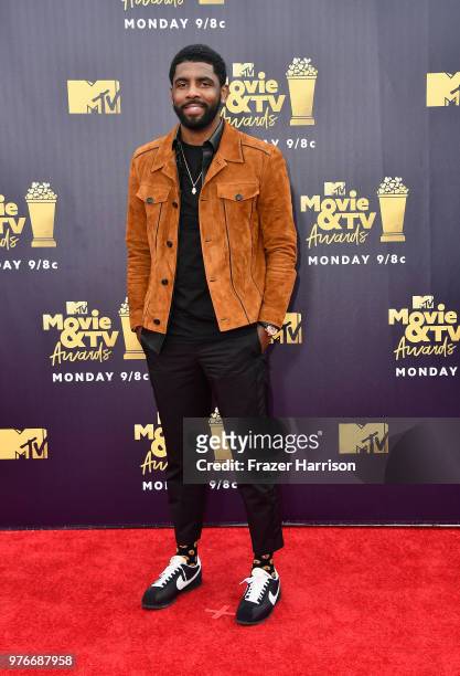 Player Kyrie Irving attends the 2018 MTV Movie And TV Awards at Barker Hangar on June 16, 2018 in Santa Monica, California.