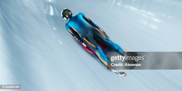 male luge athlete in professional luge track - luge imagens e fotografias de stock