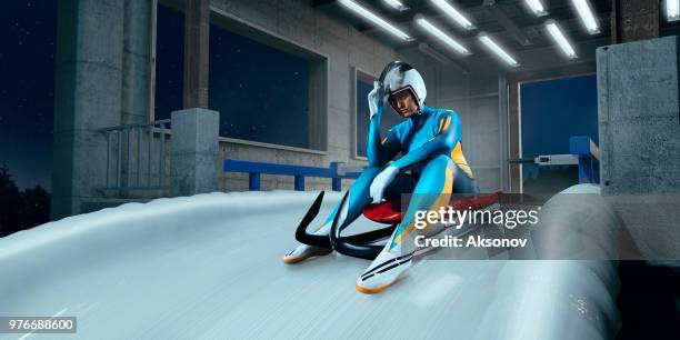 female luge athlete in start line - luge stock pictures, royalty-free photos & images