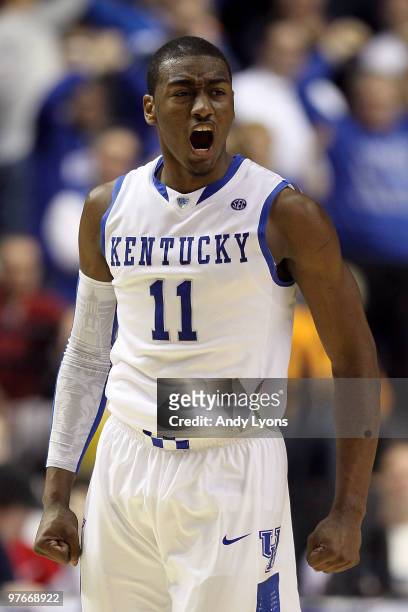 John Wall of the Kentucky Wildcats reacts in the second half against the Alabama Crimson Tide during the quarterfinals of the SEC Men's Basketball...