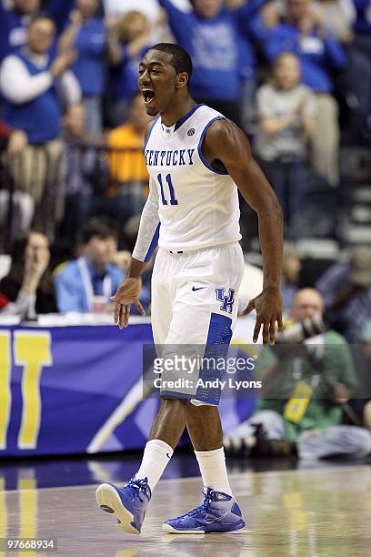 John Wall of the Kentucky Wildcats reacts in the second half against the Alabama Crimson Tide during the quarterfinals of the SEC Men's Basketball...