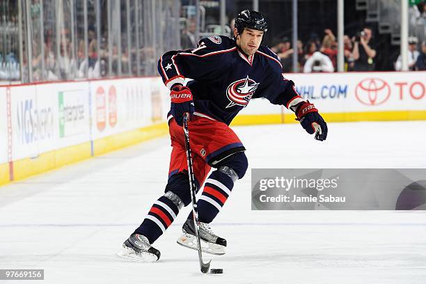 Defenseman Fedor Tyutin of the Columbus Blue Jackets skates with the puck against the Atlanta Thrashers on March 11, 2010 at Nationwide Arena in...