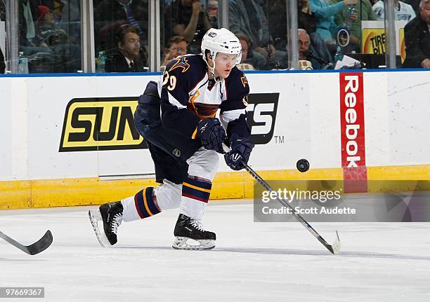 Tobias Enstrom of the Atlanta Thrashers knocks down a puck while playing against the Tampa Bay Lightning at the St. Pete Times Forum on March 6, 2010...