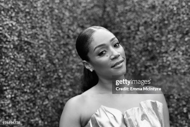 Host Tiffany Haddish attends the 2018 MTV Movie And TV Awards at Barker Hangar on June 16, 2018 in Santa Monica, California.