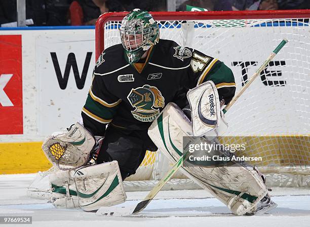 Michael Hutchinson of the London Knights gets set to make a stop in a game against the Sarnia Sting on March 10, 2010 at the John Labatt Centre in...