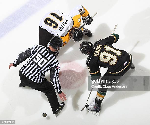 Nazem Kadri of the London Knights takes a faceoff against Craig Hottot of the Sarnia Sting in a game on March 10, 2010 at the John Labatt Centre in...