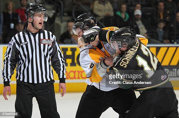 Linseman Matthew Traub watches a fight between Peter Schinkelshoek of the London Knights and Kyle Flemington of the Sarnia Sting in a game on March...