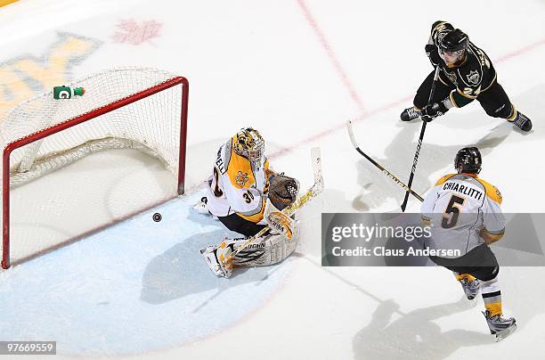 Chris DeSousa of the London Knights gets a shot on Shayne Campbell of the Sarnia Sting in a game on March 10, 2010 at the John Labatt Centre in...