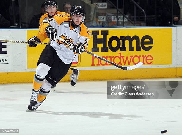 Miroslav Preisinger of the Sarnia Sting fires a pass in a game against the London Knights on March 10, 2010 at the John Labatt Centre in London,...