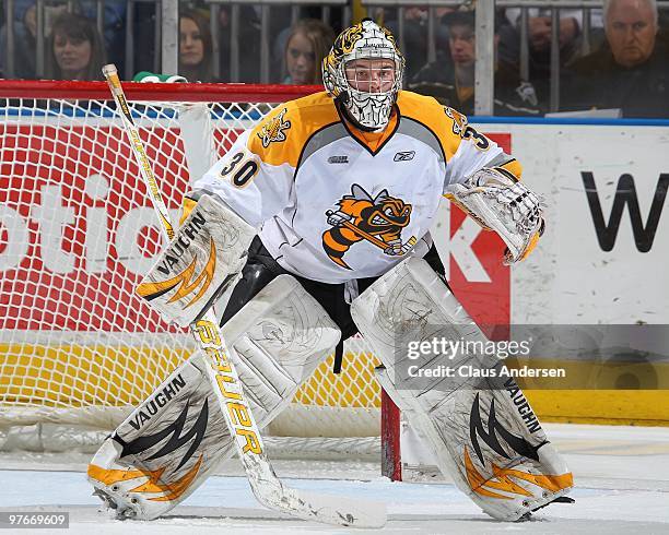 Shayne Campbell of the Sarnia Sting watches the play in a game against the London Knights on March 10, 2010 at the John Labatt Centre in London,...