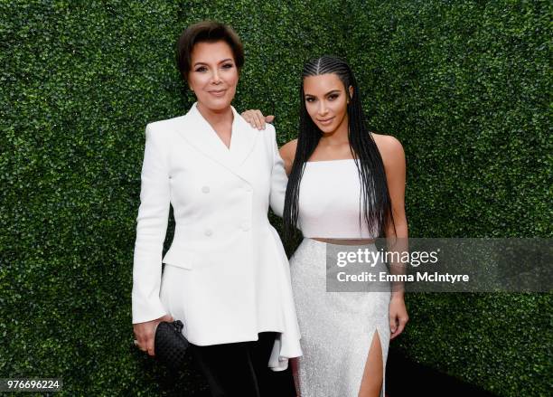 Personalities Kris Jenner and Kim Kardashian attend the 2018 MTV Movie And TV Awards at Barker Hangar on June 16, 2018 in Santa Monica, California.