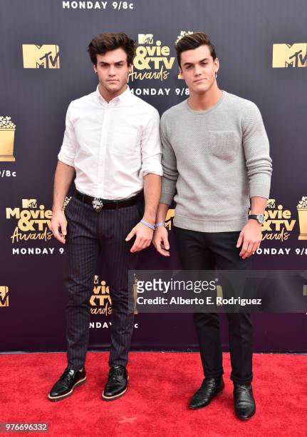 Internet personalities Ethan Dolan and Grayson Dolan attend the 2018 MTV Movie And TV Awards at Barker Hangar on June 16, 2018 in Santa Monica,...