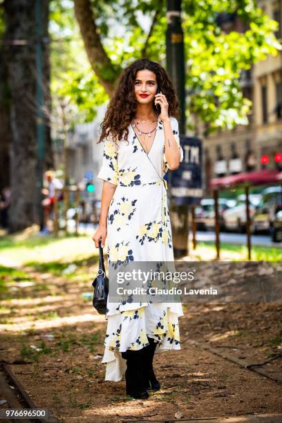 Model Chiara Scelsi, wearing Dolce Gabbana dress, is seen in the streets of Milan after the Dolce Gabbana show, during Milan Men's Fashion Week...