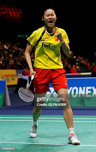 Wang Yihan of China reacts in her quarter final match against Zhou Mi of Hong Kong during The All England Open Badminton Championships at The...