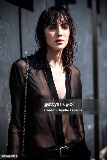 Teddy Quinlivan, wearing see through shirt, is seen in the streets of Milan after the Neil Barrett show, during Milan Men's Fashion Week...